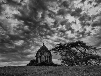 The mausoleum beneath a troubled sky.
photo ©Andrew Macdonald